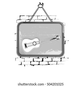 Template Stencil guitar in a frame on a brick wall in black and white style. Isolated objects on a white background, can be used with any image or text.