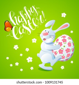 Template vector card with handwritten inscription Happy Easter. Bunny carries decorated egg. Cartoon green background. Brush lettering, calligraphy. Hand drawn font. 