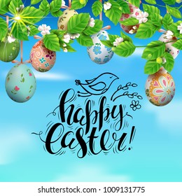 Template vector card with realistic colorful 3D eggs and blossom cherry. Handwritten inscription Happy Easter.  Bright sunny background. Decorated eggs hang on a tree. Modern calligraphy.