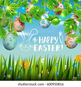 Template vector card with realistic colorful eggs, grass and flowers. Handwriting inscription Happy Easter and bunny. Sunny background. 3D. Decorated  colorful  eggs hanging on a branches.