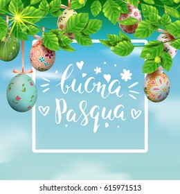 Template vector card with realistic colorful eggs and foliage. Handwriting Italian inscription Happy Easter. Bright sunny background. Lettering, calligraphy. 3D. Decorated eggs hang on a tree.