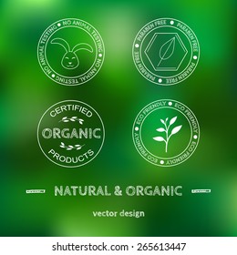 Templates and labels for organic cosmetics, products on green blurred background.