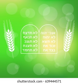 Ten commandment with barley on bokeh background for Shavuot festival