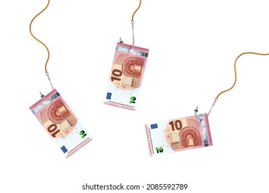 Ten euro banknotes on glossy silver metal fishing hooks on a ropes isolated on white