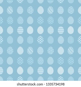 Tender blue Happy Easter seamless pattern with white decorated eggs. Gentle ornamental eggs texture for Easters package, gift wrapping paper, textile, covers, background