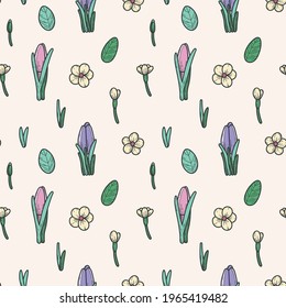Tender floral seamless pattern with crocuses, primulas and leaves on a light background. Violet, pink, yellow and mint. Suitable for cards, wallpaper, paper, fabric, interior decor  and others