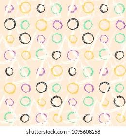 Tender grunge scandinavian seamless pattern with colorful circles on pastel yellow background. Vector chalk scribble girlish polka dot texture for textile, wrapping paper, cover, surface, wallpaper