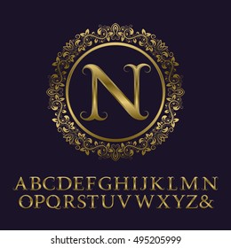 Tendrils gold letters with N initial monogram. Baroque style font for logo design. Isolated english vintage alphabet.