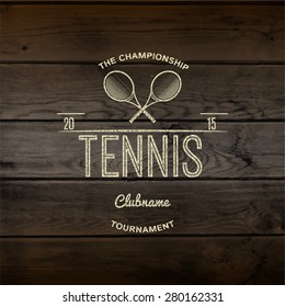 Tennis badges logos and labels for any use,  on wooden background texture