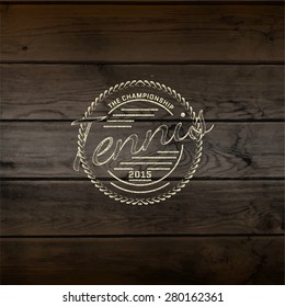Tennis badges logos and labels for any use,  on wooden background texture