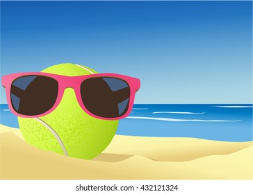 Tennis ball on the beach sand