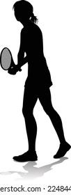 A tennis player woman female sports person in silhouette 