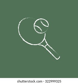 Tennis racket and ball hand drawn in chalk on a blackboard vector white icon isolated on a green background.