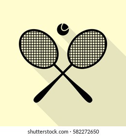 Tennis racket sign. Black icon with flat style shadow path on cream background.