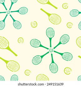 Tennis rackets round a ball of green color