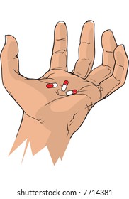 tense hand with capsules on it