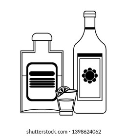 Tequila bottles and shot with lemon in black and white