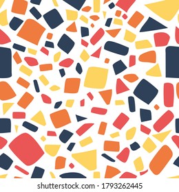 Terrazzo creative seamless pattern. Granite fragments abstract backdrop. Chaotic mosaic with pieces on white background. Stones and rocks color texture.