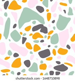 Terrazzo floor covering seamless pattern in mint, yellow, grey colors. Vector background of the Italian floor in the Venetian style. Granite texture in a trendy style.