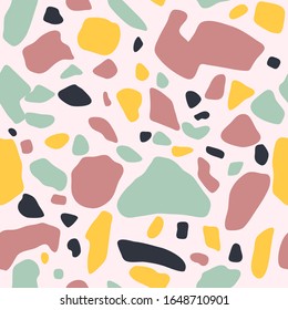 Terrazzo floor covering seamless pattern in mint, pink and yellow colors. Vector background of the Italian floor in the Venetian style. Granite texture in a trendy style.