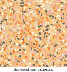 Terrazzo flooring texture. Golden seamless pattern background. Abstract vector design for print on floor, wall, tile or textile