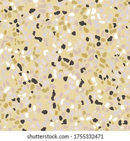 Terrazzo flooring texture. Golden seamless pattern background. Abstract vector design for print on floor, wall, tile or textile