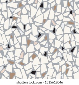Terrazzo flooring vector grey seamless pattern. Texture with white telltale chips by Venetian and Sottsass's Memphis style.