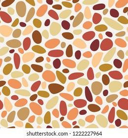 Terrazzo pebble texture pattern in light , orange, tan and rust. Light background with  multicolor stones. For textiles, fashion, gift wrapping paper, scrapbooking, paper and graphic design projects.
