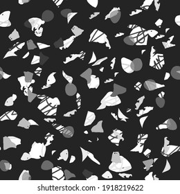 Terrazzo seamless pattern. Black and white classic flooring texture. Charming background made of natural stones, granite, quartz, marble, and concrete. Favorable seamless terrazzo.
