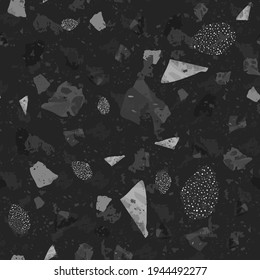 Terrazzo seamless pattern. Black and white classic flooring texture. Charming background made of natural stones, granite, quartz, marble, and concrete. Fascinating seamless terrazzo.