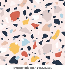 Terrazzo seamless pattern with colorful rock pieces. Abstract backdrop with stone sprinkles scattered on light background. Modern vector illustration for fabric print, wrapping paper, flooring.