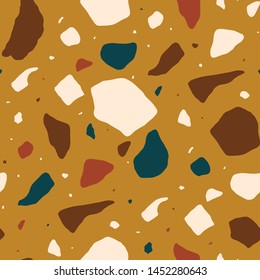 Terrazzo seamless pattern with colorful stone fragments. Decorative backdrop with mineral rock pieces scattered on orange background. Creative vector illustration for textile print, wrapping paper.