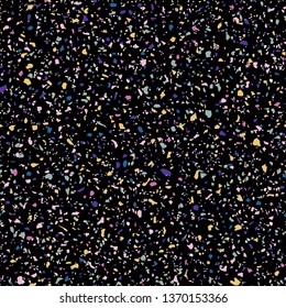 Terrazzo texture. Colorful confetti seamless pattern. Vector abstract background with small randomly scattered dots. Dark terazzo pattern. Pink, purple, blue, yellow, green spots on black backdrop