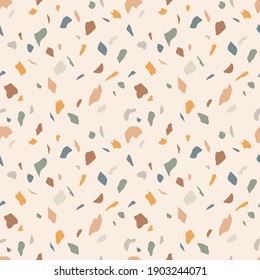 Terrazzo vector seamless pattern in trendy grey and yellow colors. Perfect for interior design, flooring, ceramic tile and graphic design.