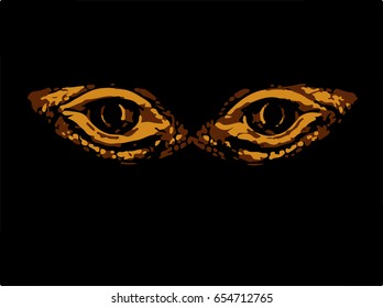 Terrible horrible eyes fantastic animal or bird on a black background. Eyes dinosaur or snakes.