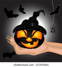 Terrible Pumpkin on a hand at witch.Halloween. Halloween banner. Vector illustration