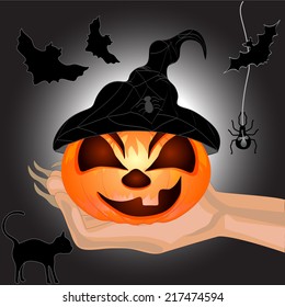 Terrible Pumpkin on a hand at witch.Halloween. Halloween banner. Vector illustration