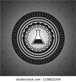 test tube icon inside black emblem