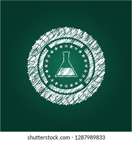 test tube icon inside chalk emblem