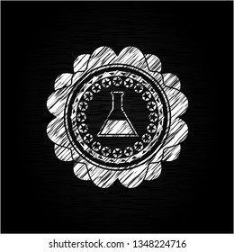 test tube icon inside chalk emblem