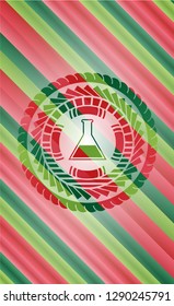 test tube icon inside christmas colors badge.