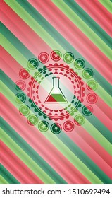 test tube icon inside christmas colors style emblem.