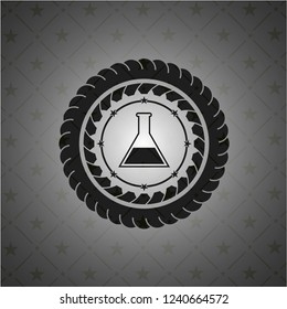 test tube icon inside dark emblem