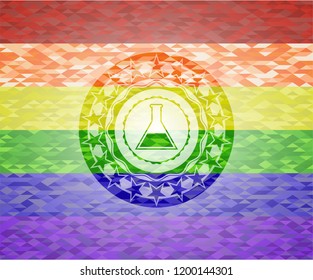 test tube icon inside emblem on mosaic background with the colors of the LGBT flag