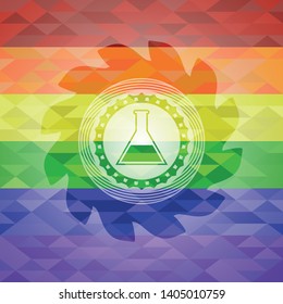test tube icon inside emblem on mosaic background with the colors of the LGBT flag