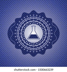 test tube icon inside emblem with jean high quality background