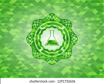 test tube icon inside green emblem with mosaic ecological style background