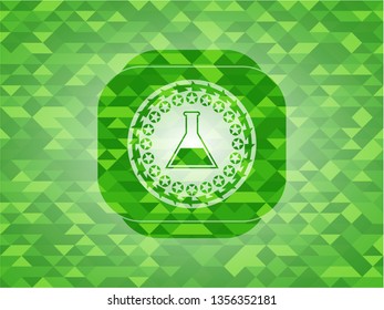 test tube icon inside green emblem with mosaic background