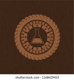 test tube icon inside retro wooden emblem