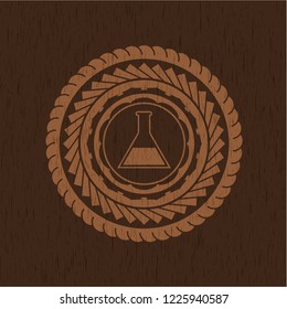 test tube icon inside retro wood emblem